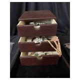 Jewelry box with some jewelry in it