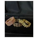 Lot of 3 pink/gold tone bracelets