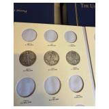 3 Walking Liberty Silver Half Dollars in Book