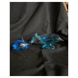 Lot of 2 blue dolphins, one has UV reactivity