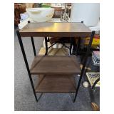 Small metal floor shelf