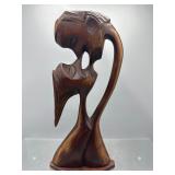 African carving couple kissing