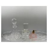 Vintage perfume bottles and tray