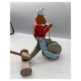Monkey riding bike pull toy