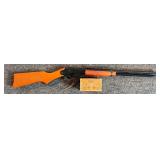 Red Ryder BB gun and box of babies