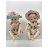 Vintage porcelain piano baby figures