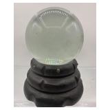 Glass sphere on base