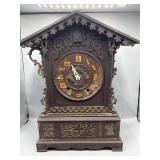 Antique carved wood mantle cuckoo clock