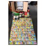 Pokï¿½mon card collection with toys and coins