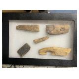 Lot of Alaska Artifacts (ivory) in case