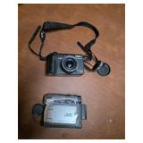 Vintage cannon camera and JVC recorder. T8