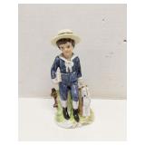 Boy with dog figurine, made in Korea