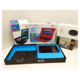 Group of electronics in original boxes