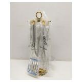 Stainless utensil set on matching stand, new