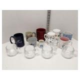 Group of coffee mugs and small vases