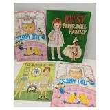 Lot of 4 paper doll books