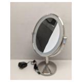 Double sided make-up mirror
