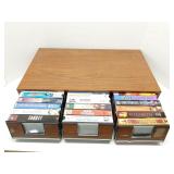 Group of VHS tapes in case