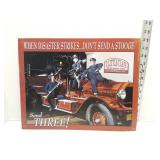 Send a Stooge metal sign