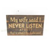 Never Listen wood sign
