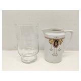 2 small water pitchers, one is from Germany
