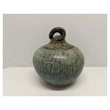 Stoneware lidded jar, 9' x 8'