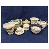 Group of bone china tea cups & saucers