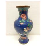 Enamelled brass blue vase