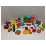 Group of kid's toys and Play-Doh