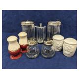 Group of salt pepper shakers, sugar container &