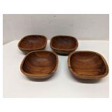 Set of 4 carved wood bowls