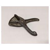 Vintage metal lemon squeezer
