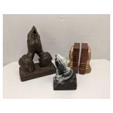 Group of praying hands decor items