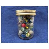 Jar of vintage marbles