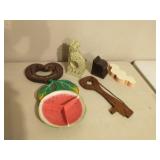 Group of decor items, most are wood