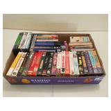 Flat of VHS tapes and books