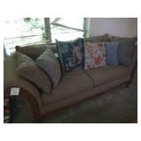 Green fabric sofa w/ wood accents, 8 ft