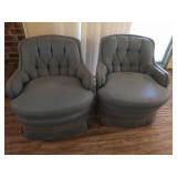 Pair of blue fabric armchairs, cushions are worn