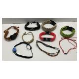 Group of Paracord and Leather Bracelets .