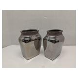 Pair of mirrored ceramic vases