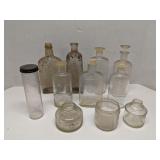 Group of clear vintage glass bottles