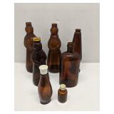 Group of amber/brown vintage glass bottles