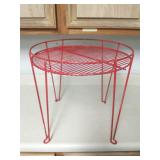 Round red metal table