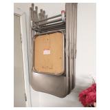 Group of metal folding chairs