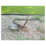 Vintage plow yard art