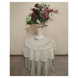 Faux flowers in vase plus small table