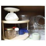 Contents of cabinet - lazy susan and glass ware