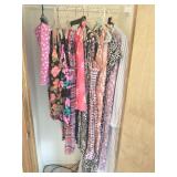 Clothes in foyer closet, XL and XXL