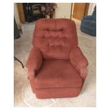 Red fabric recliner, swivels & rocks