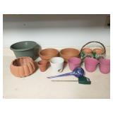 Group of terracotta and plastic planters
